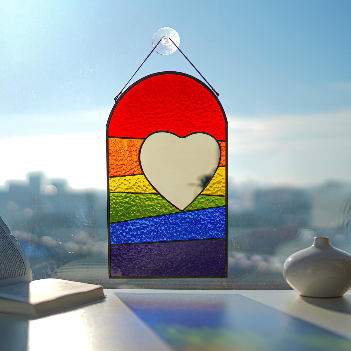 Handmade stained glass rainbow heart window hanging with mirror center, arched shape, LGBT pride colors, Tiffany copper foil art
